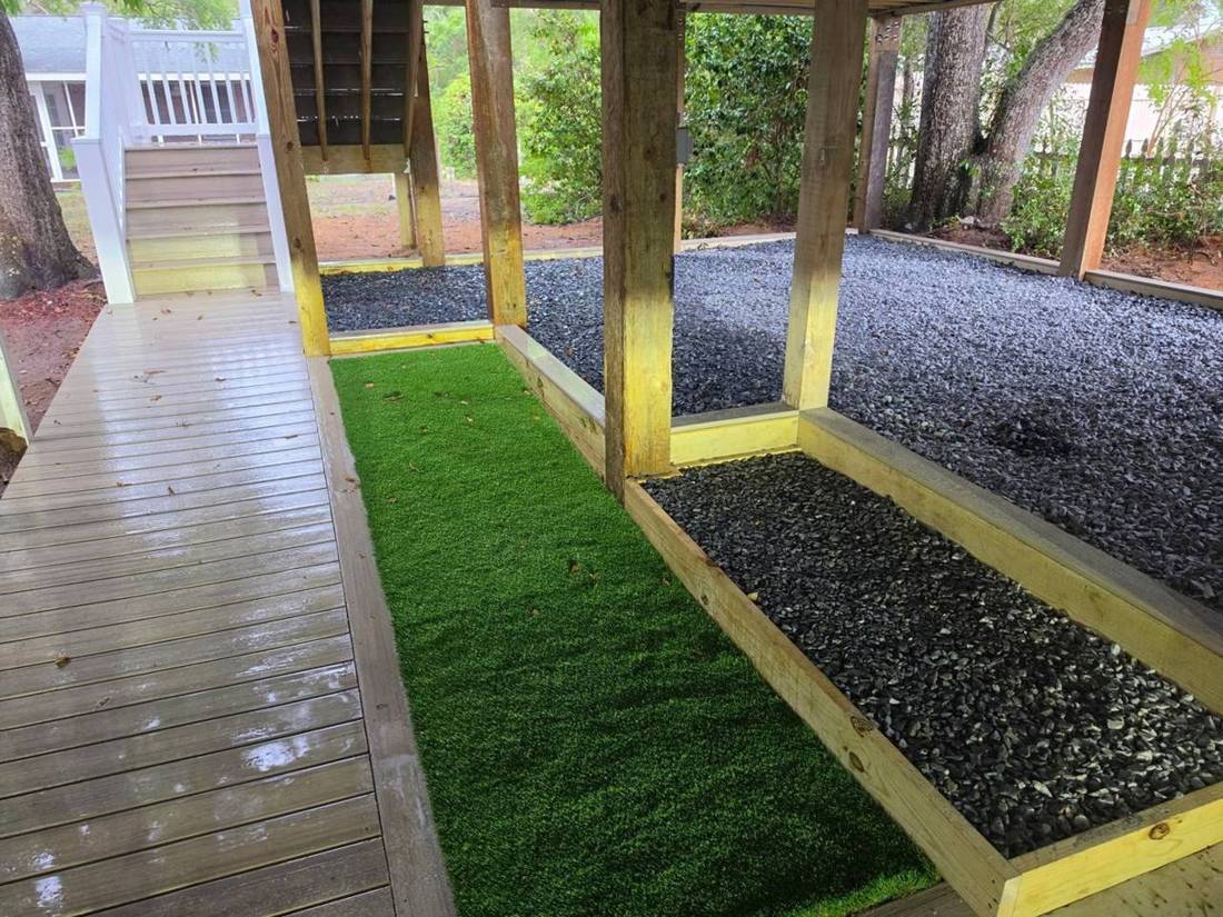 Turf and gravel beds under a deck