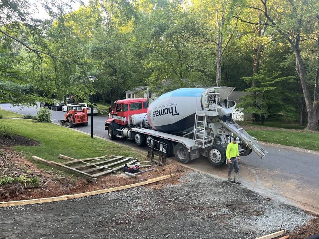 Concrete truck and crew at the driveway pour