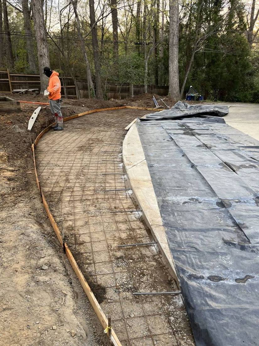 Rebar grid set inside curved forms before a concrete pour