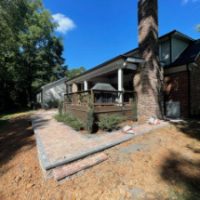 Cornhole area and path extension around deck