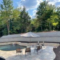 Double retaining walls with french drains behind pool, Landmark advanced outdoor solutions, Charlotte NC