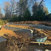 French drains behind each wall