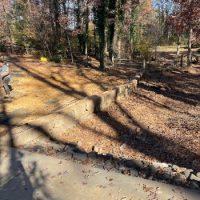 boulder retaining wall installation hardscape